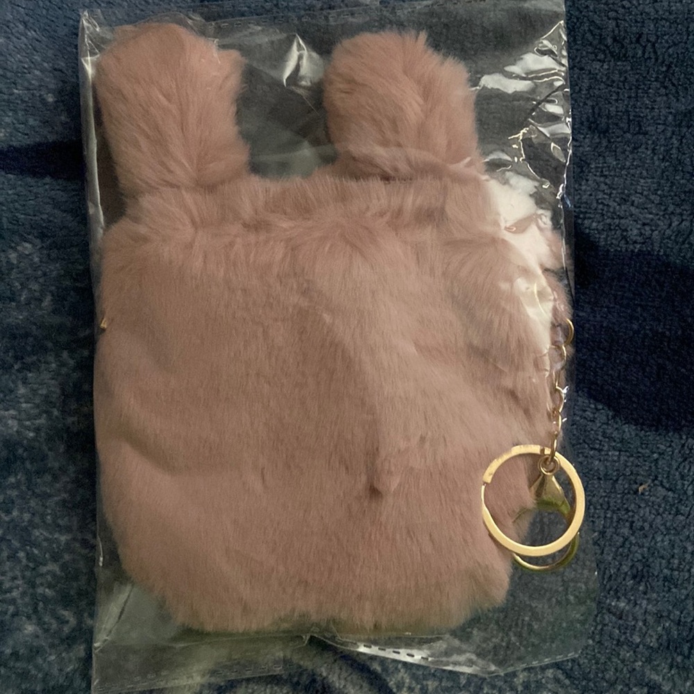 A coin bag with a chain to hold your keys and etc
